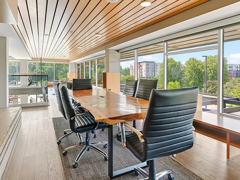 Meet, plan, or collaborate in this modern clubhouse workspace with natural light and elevated views.