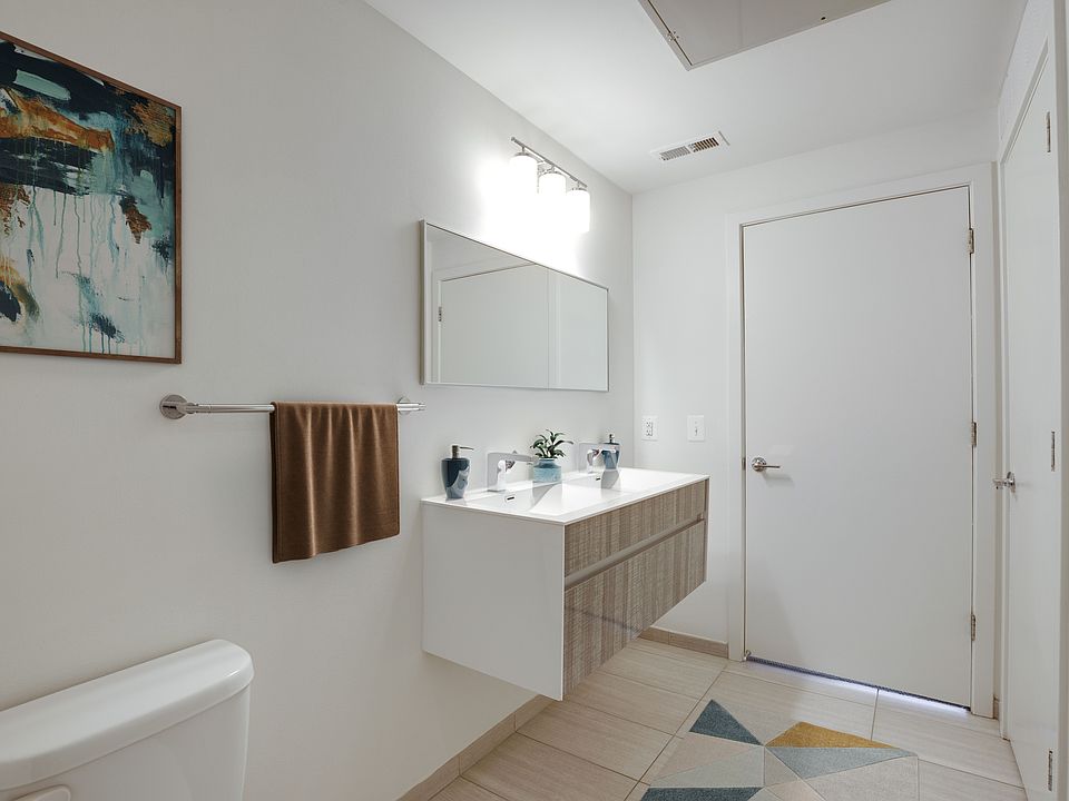 Two-bedroom bathroom (virtually staged)
