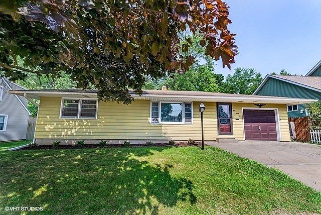 Maintenance free exterior, concrete driveway, and move-in ready!