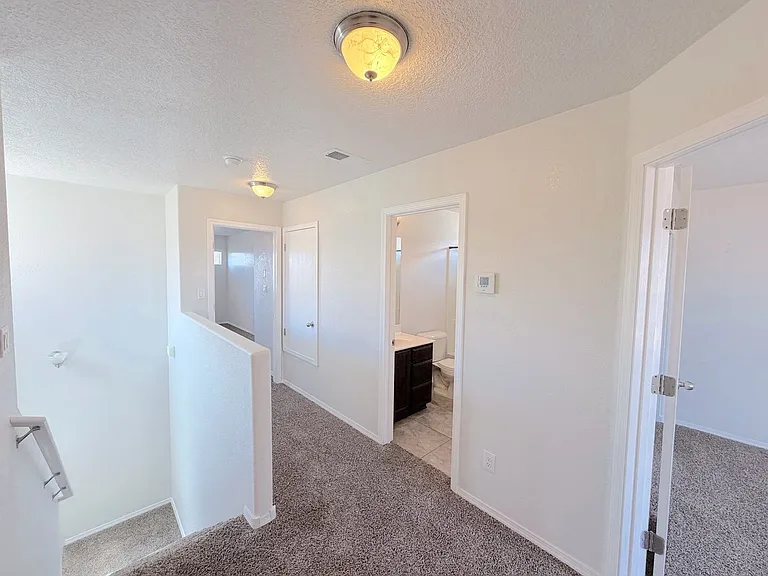 8323 Groundsel Rd NW — Photo 12