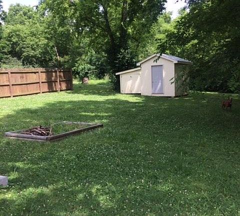 Big yard to relax or play in, big storage shed for your use 
