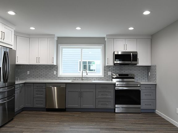 Grey Kitchen with Samsung stainless steel appliances. Unit 2&5