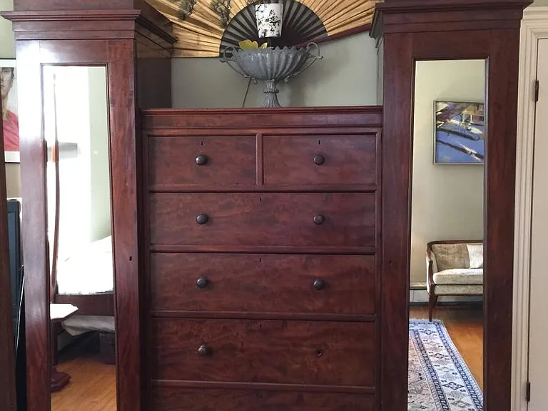 Mammoth European double armoire with dresser drawers 8 to 12 inches tall