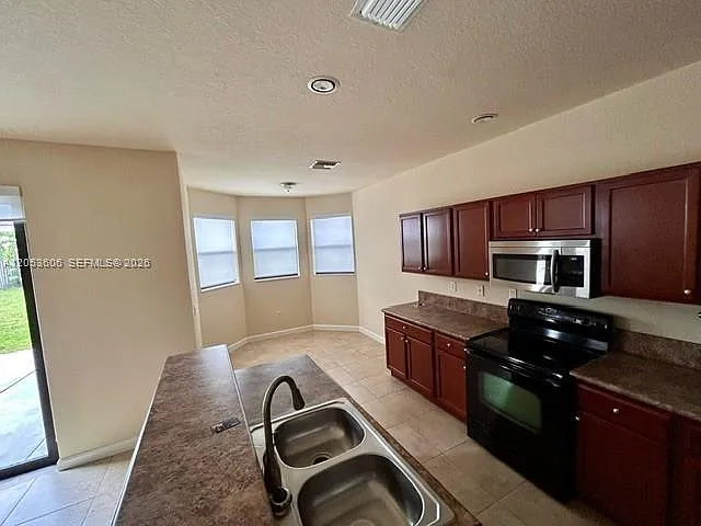 14435 SW 16th St — Photo 9