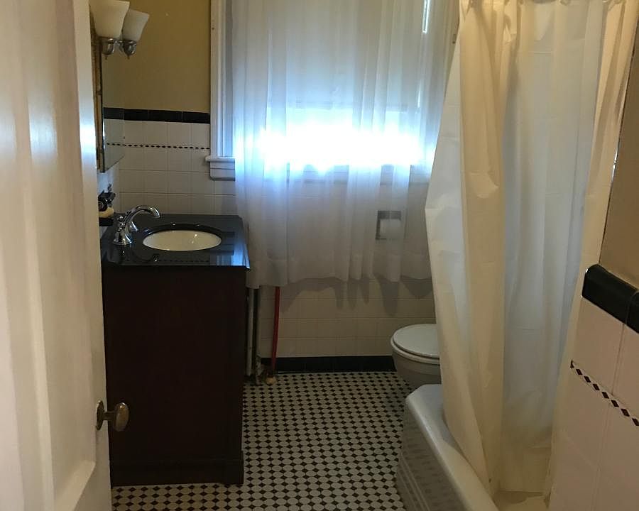 Black and white tiled bathroom
