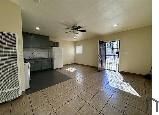 2nd image of 9707 S San Pedro St #4