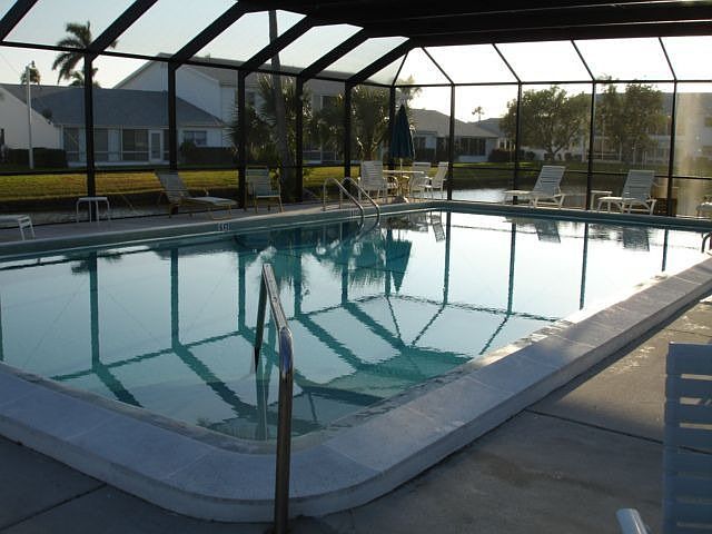 Heated Pool at clubhouse with exercise room, library, billiards and bbq area..