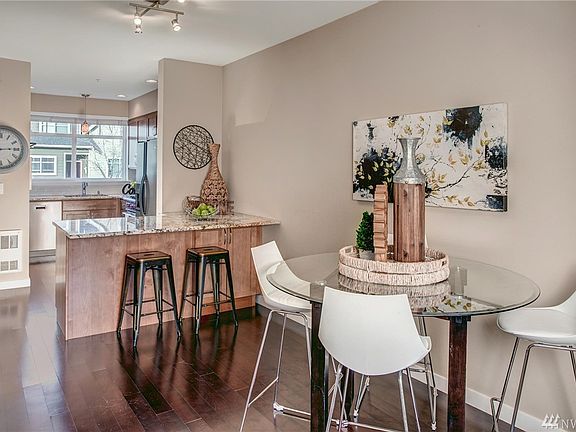 The open floor plan offers casual sophistication throughout, perfect for entertaining.  