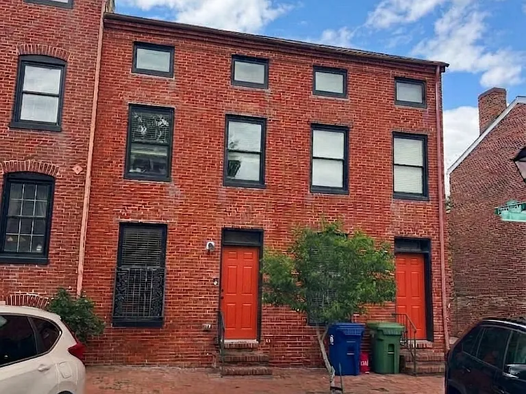 Front of the house.
The double-wide rowhouse is indicated by orange doors