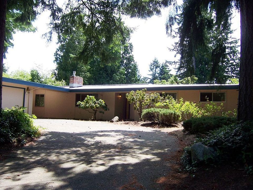 View from street - mature landscaping in natural setting
