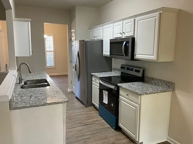 11715 Harsworth Ln — Photo 2