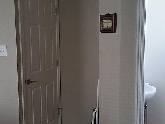 First Floor 1/2 bath & Door to Basement