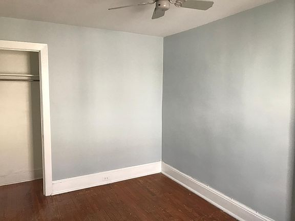 2nd bedroom with ceiling fan