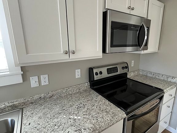 Kitchen: All new Shaker style cabinetry with new stainless steel appliances.
