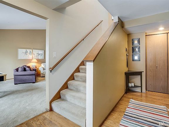 The entry is light and bright with views into the living room.