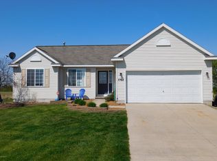 7765 Dream Isle Dr NE, Belding, MI 48809