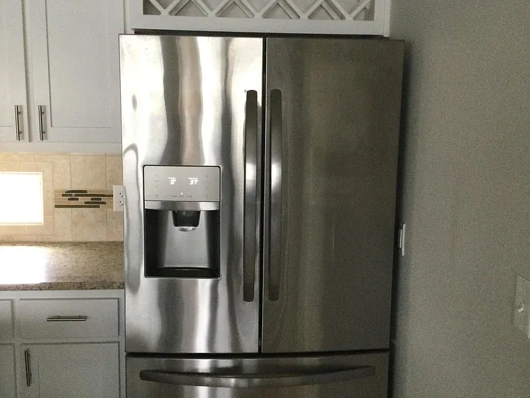 High capacity fridge/ freezer comes with the house