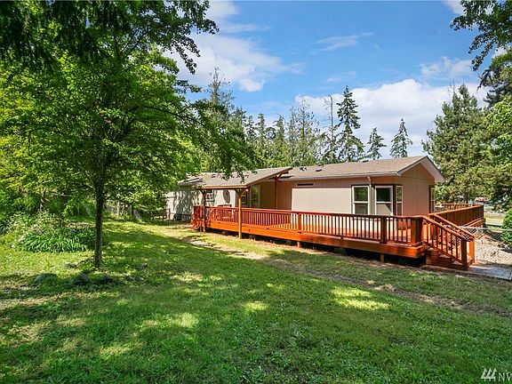 The rear of the home offers the covered portion of an over-1700sf wrap-around deck!  