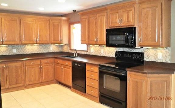 Tons of Storage, pull-out shelving, can lighting, tons of counter space