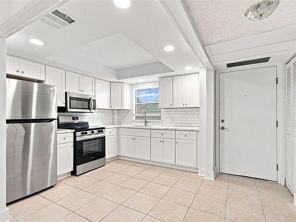 2nd image of 4650 COVE CIRCLE #104
