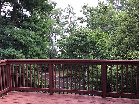 Balcony off master bedroom overlooking the lake