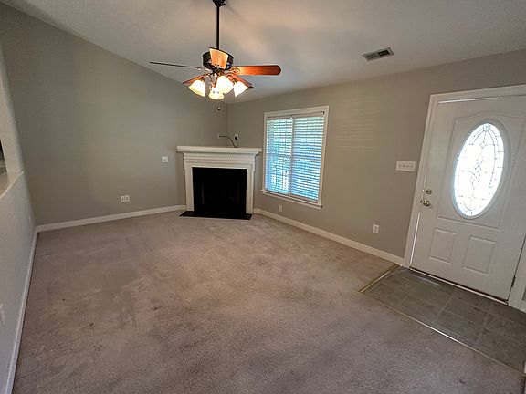Living room with vaulted ceilings