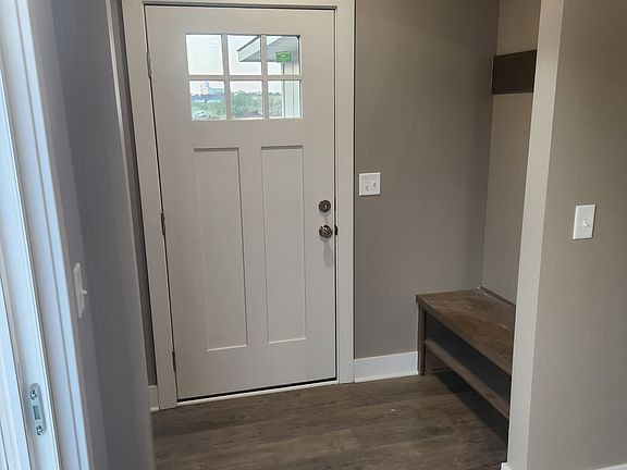 Entry way with bench and coat rack