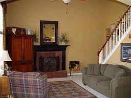 Family Room With Back Stairway