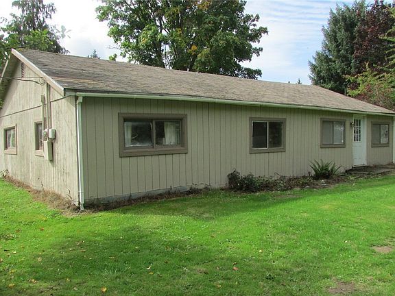 Sunny lot view from the front of the home.
