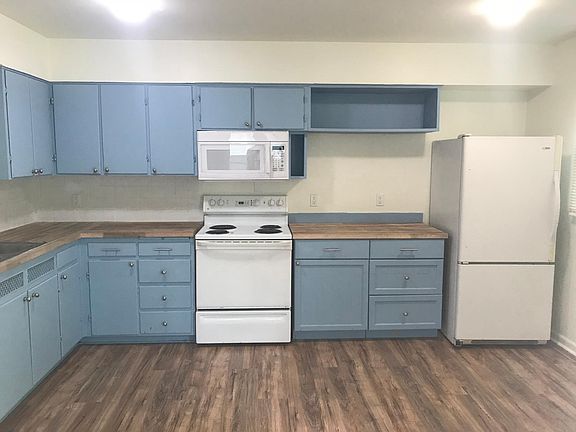 Large open kitchen with microwave, dishwasher, etc