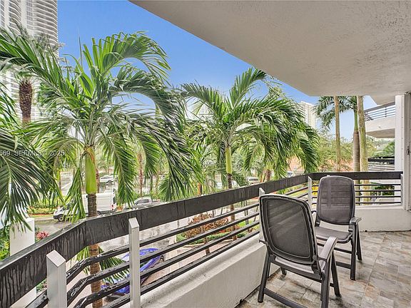 3rd image of 3600 Mystic Pointe Dr APT 311