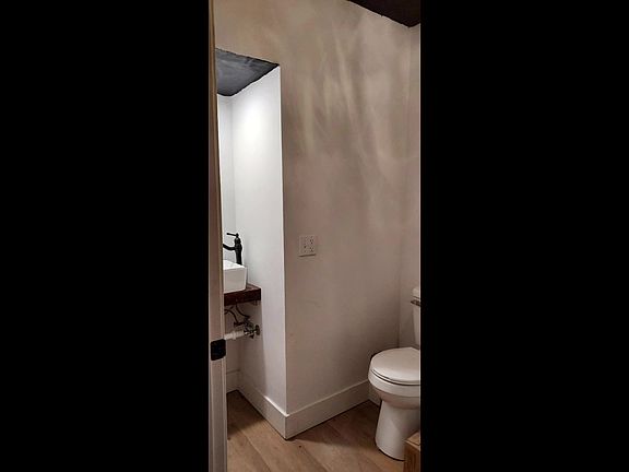 1/2 bath in entry hall in laundry room (Shared room)