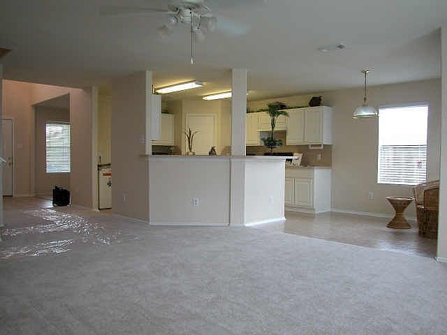 Den with kitchen view