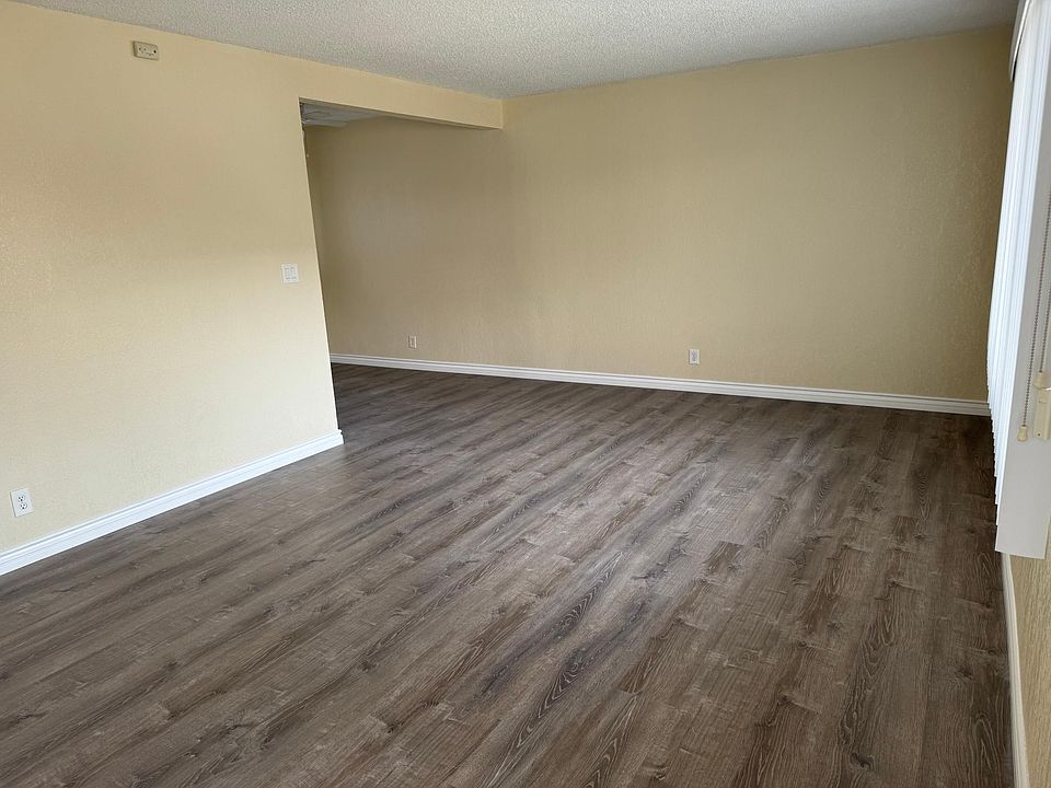 Living room looking towards the dining area and kitchen.
