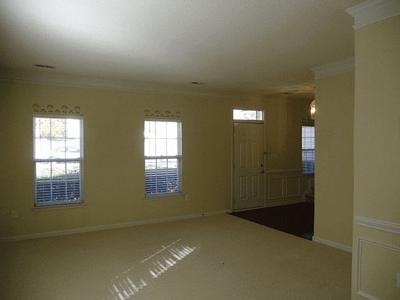 Foyer Leads to Living Room