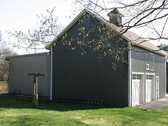 Large barn with 2 car garage plus tons of storage/workshop space