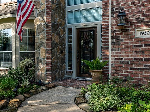 Welcome home! Front door is wood with leaded glass.