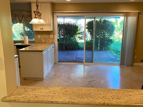 Entryway view into Dining Nook to Backyard