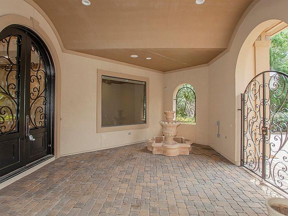 Gorgeous Canterra Double Doors add to the glamour. Second fountain in courtyard.