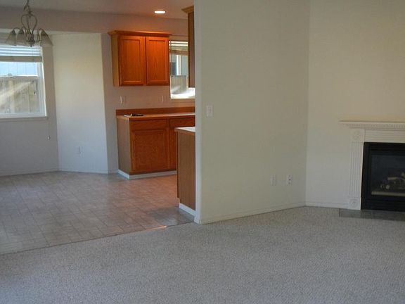 Gas Fireplace in Vaulted Living Room. Dining area and Kitche