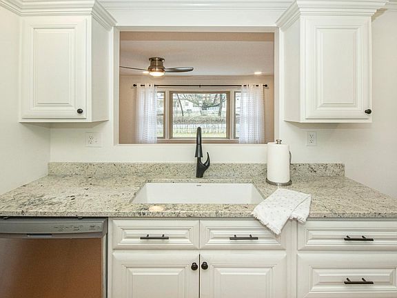 Such a lovely view as you enjoy spending time in the kitchen !! New Blanco sink, too!