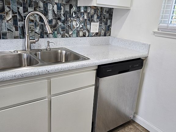 built in dishwasher, state of the art faucet & fixtures