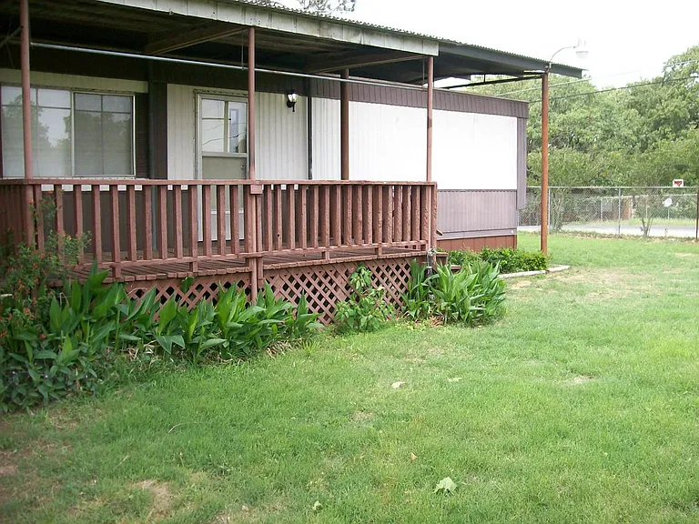 Nice landscaped yard and shade