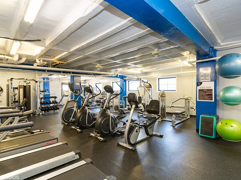 Cardio zone featuring treadmills and ellipticals