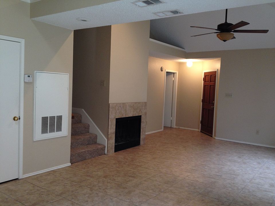 Living Room with Fireplace and Ceramic Tile Floors