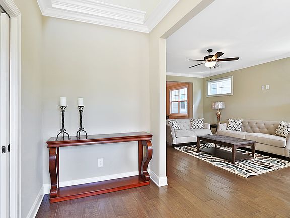 Beautiful entry with open concept to the living and dining rooms.