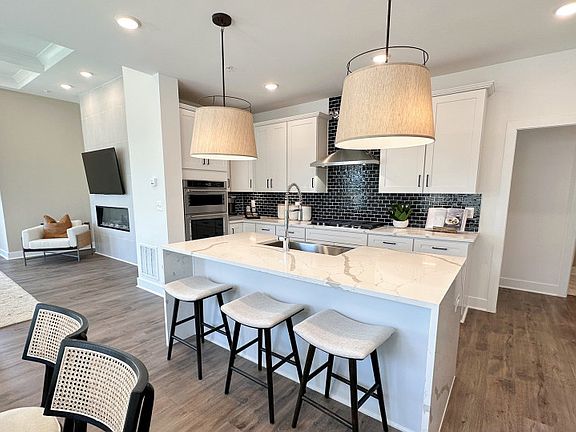 Beautiful Gourmet Kitchen with White Cabinetry