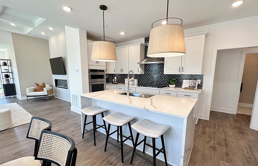 Beautiful Gourmet Kitchen with White Cabinetry