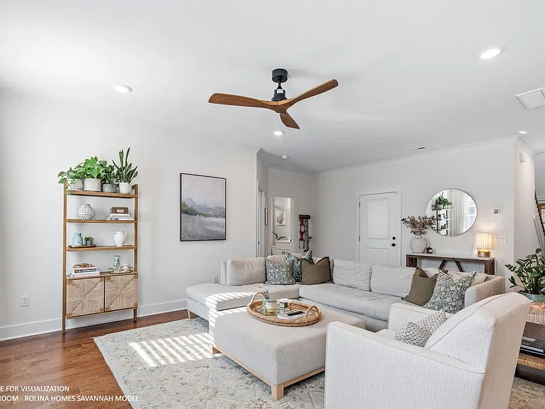 LIVING ROOM PICTURE FROM A DIFFERENT SAVANNAH MODEL RECENTLY BUILT BY ROLINA HOMES