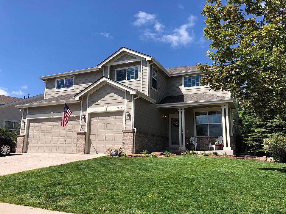 Front of house, 3 car garage